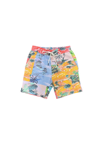 Tropical patterned shorts on a white background