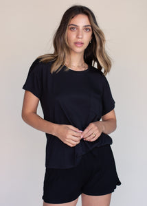 woman wearing boxy tee with pocket in black