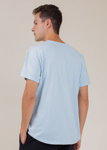 man wearing t-shirt in sky blue