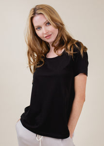 woman wearing relaxed crewneck tee in black