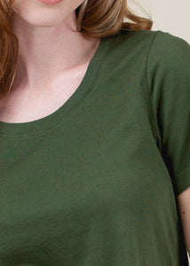 close up of woman wearing relaxed crewneck tee in green