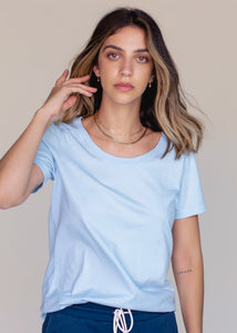 woman wearing relaxed crewneck tee in sky blue