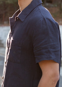 side view of men's navy linen button down