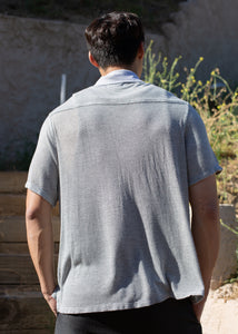 back view of man wearing mesh button down in heathered grey