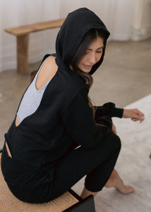 woman wearing post workout cover up hoodie in porcelain