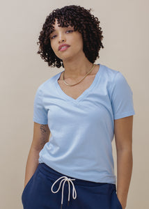 woman wearing sky blue vneck tee