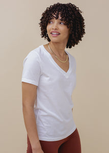 woman wearing white vneck tee