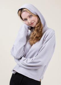 woman wearing post workout cover up hoodie in slate